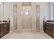 Luxurious bathroom with double walk-in showers and vanities at 1228 Eppinger Dr, Port Charlotte, FL 33953