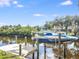Covered boat lift on a private dock at 1228 Eppinger Dr, Port Charlotte, FL 33953