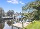 Private dock with boat lift on a calm waterway at 1228 Eppinger Dr, Port Charlotte, FL 33953