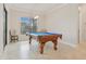 Bright game room with a pool table and sliding glass doors at 1228 Eppinger Dr, Port Charlotte, FL 33953
