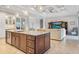 Open concept kitchen with large island, granite counters and breakfast bar at 1228 Eppinger Dr, Port Charlotte, FL 33953