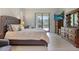 Spacious main bedroom with king-size bed and large windows at 1228 Eppinger Dr, Port Charlotte, FL 33953