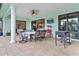 Covered patio features dining area, grill, and kitchen at 1228 Eppinger Dr, Port Charlotte, FL 33953