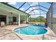 Inviting pool and spa with screened enclosure at 1228 Eppinger Dr, Port Charlotte, FL 33953