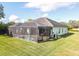 Enjoy the screened-in pool and spa at 1228 Eppinger Dr, Port Charlotte, FL 33953