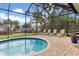 Relaxing pool and spa with water view at 1228 Eppinger Dr, Port Charlotte, FL 33953