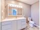 Bathroom with vanity and lighted mirror at 125 Graham Sw St, Port Charlotte, FL 33952