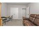 This bedroom features gray walls, carpet floors, and a large double door closet at 16031 Alcira Cir, Punta Gorda, FL 33955