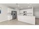 A spacious kitchen with stainless steel appliances and a large island with countertop seating at 16031 Alcira Cir, Punta Gorda, FL 33955