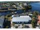 Single-story home with metal roof and canal access at 193 N Waterway Nw Dr, Port Charlotte, FL 33952