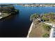 Aerial view of waterfront property with lush landscaping and private dock at 193 N Waterway Nw Dr, Port Charlotte, FL 33952