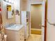 Bright bathroom with marble vanity and additional storage at 193 N Waterway Nw Dr, Port Charlotte, FL 33952