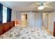 Main bedroom with barn door to ensuite bathroom at 193 N Waterway Nw Dr, Port Charlotte, FL 33952