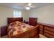 Spacious bedroom with a ceiling fan and ample closet space at 193 N Waterway Nw Dr, Port Charlotte, FL 33952