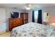 Guest bedroom with ample closet space and dresser at 193 N Waterway Nw Dr, Port Charlotte, FL 33952
