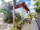 Metal boat storage shed with tropical landscaping at 193 N Waterway Nw Dr, Port Charlotte, FL 33952