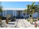 Charming light blue house with a landscaped front yard at 193 N Waterway Nw Dr, Port Charlotte, FL 33952