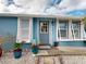 Charming light blue home with white shutters at 193 N Waterway Nw Dr, Port Charlotte, FL 33952