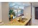 Kitchen view of pool and patio from the breakfast bar at 193 N Waterway Nw Dr, Port Charlotte, FL 33952