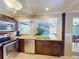 Modern kitchen with stainless steel appliances and granite countertops at 193 N Waterway Nw Dr, Port Charlotte, FL 33952
