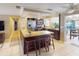 Large kitchen with island, granite counters & stainless steel appliances at 193 N Waterway Nw Dr, Port Charlotte, FL 33952