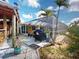 Outdoor patio area with grill and pool views at 193 N Waterway Nw Dr, Port Charlotte, FL 33952
