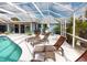 Spacious pool deck with lounge chairs for ultimate relaxation at 193 N Waterway Nw Dr, Port Charlotte, FL 33952
