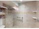Walk-in shower with glass enclosure and tiled surround at 193 N Waterway Nw Dr, Port Charlotte, FL 33952