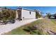 Small shed and grassy yard with gravel border at 193 N Waterway Nw Dr, Port Charlotte, FL 33952