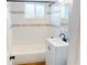 Bathroom with tub and shower combo, updated vanity and mirror at 22143 Lasalle Rd, Port Charlotte, FL 33952