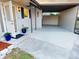 Open carport with ample space, providing convenient covered parking near the front entrance at 22143 Lasalle Rd, Port Charlotte, FL 33952