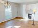 Modern dining room with an elegant light fixture, complemented by tile flooring at 22143 Lasalle Rd, Port Charlotte, FL 33952