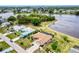 Home on the water, surrounded by lush greenery at 2259 Kenya Ln, Punta Gorda, FL 33983