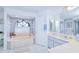 Relaxing bathroom features a garden tub beneath a large arched window at 2259 Kenya Ln, Punta Gorda, FL 33983