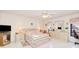 Relaxing bedroom with comfortable bed, dresser, TV, and tile floors at 2259 Kenya Ln, Punta Gorda, FL 33983