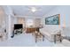 Comfortable living room with tile flooring, decorative columns and large painting on the wall at 2259 Kenya Ln, Punta Gorda, FL 33983