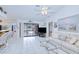 Cozy living room featuring a sliding glass door leading to the pool and outdoor spaces at 2259 Kenya Ln, Punta Gorda, FL 33983