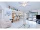 Bright living room with tile floors and easy access to kitchen, pool and patio at 2259 Kenya Ln, Punta Gorda, FL 33983