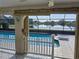 Beautiful pool area with screened enclosure and lake view at 2259 Kenya Ln, Punta Gorda, FL 33983