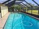 Inviting screened pool with ample space for relaxation at 2259 Kenya Ln, Punta Gorda, FL 33983