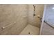 Bathroom with shower stall and grab bars at 23104 Rountree Ave, Port Charlotte, FL 33980