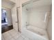 Bathroom with jetted tub and shower at 23104 Rountree Ave, Port Charlotte, FL 33980