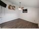 Bedroom with wood-look floors and ceiling fan at 23104 Rountree Ave, Port Charlotte, FL 33980