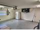 Garage with AC unit, refrigerator, and extra storage space at 23104 Rountree Ave, Port Charlotte, FL 33980