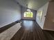 Spacious living room with vaulted ceilings and large windows at 23104 Rountree Ave, Port Charlotte, FL 33980