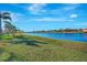 Peaceful waterfront property with lush lawn at 2321 Sofia Ln, Punta Gorda, FL 33983
