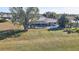 An aerial view of the home's backyard, including a screened pool at 2321 Sofia Ln, Punta Gorda, FL 33983