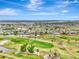 Expansive aerial view of community and golf course at 24 Oakland Hills Ct, Rotonda West, FL 33947