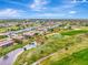 Community overview: golf course, waterways and homes at 24 Oakland Hills Ct, Rotonda West, FL 33947