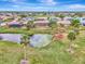 Aerial view of home, highlighting its location and canal views at 24 Oakland Hills Ct, Rotonda West, FL 33947
